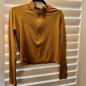 Lululemon Swiftly Tech Cropped Half Zip in gold